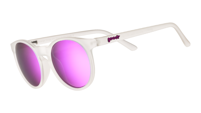Clear frame sunglasses with purple mirrored lenses shown at three-quarter angle