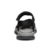Black sports sandal with adjustable straps and gray sole, rear view