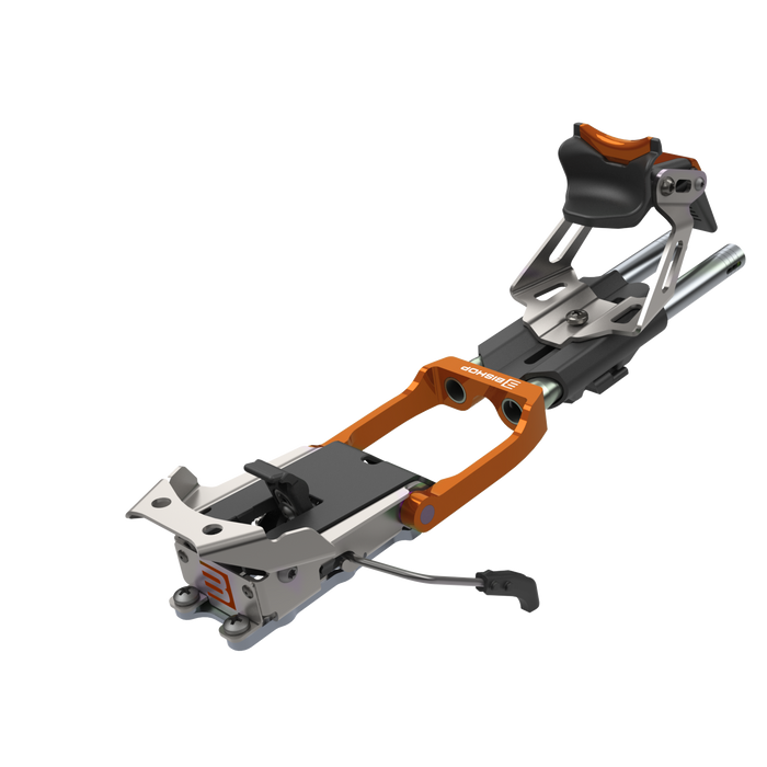 Telemark ski binding with orange frame and silver metal components on white background