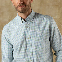 Light plaid button-down shirt with collar and long sleeves, front view on model