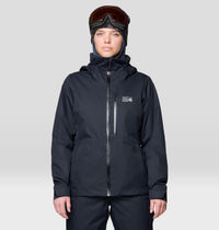 Women's insulated ski jacket in black, front view, with hood and ski goggles