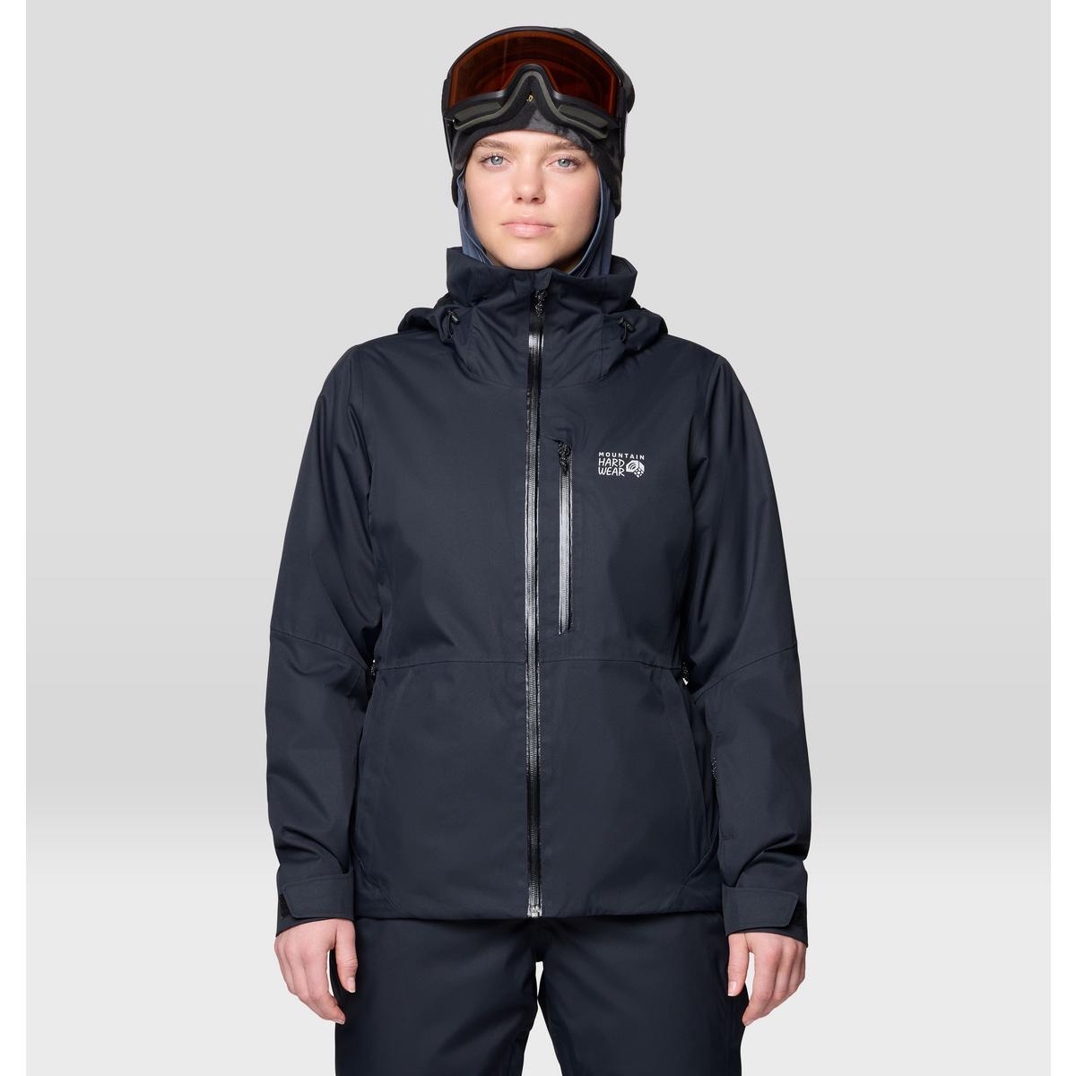 Women's insulated ski jacket in black, front view, with hood and ski goggles