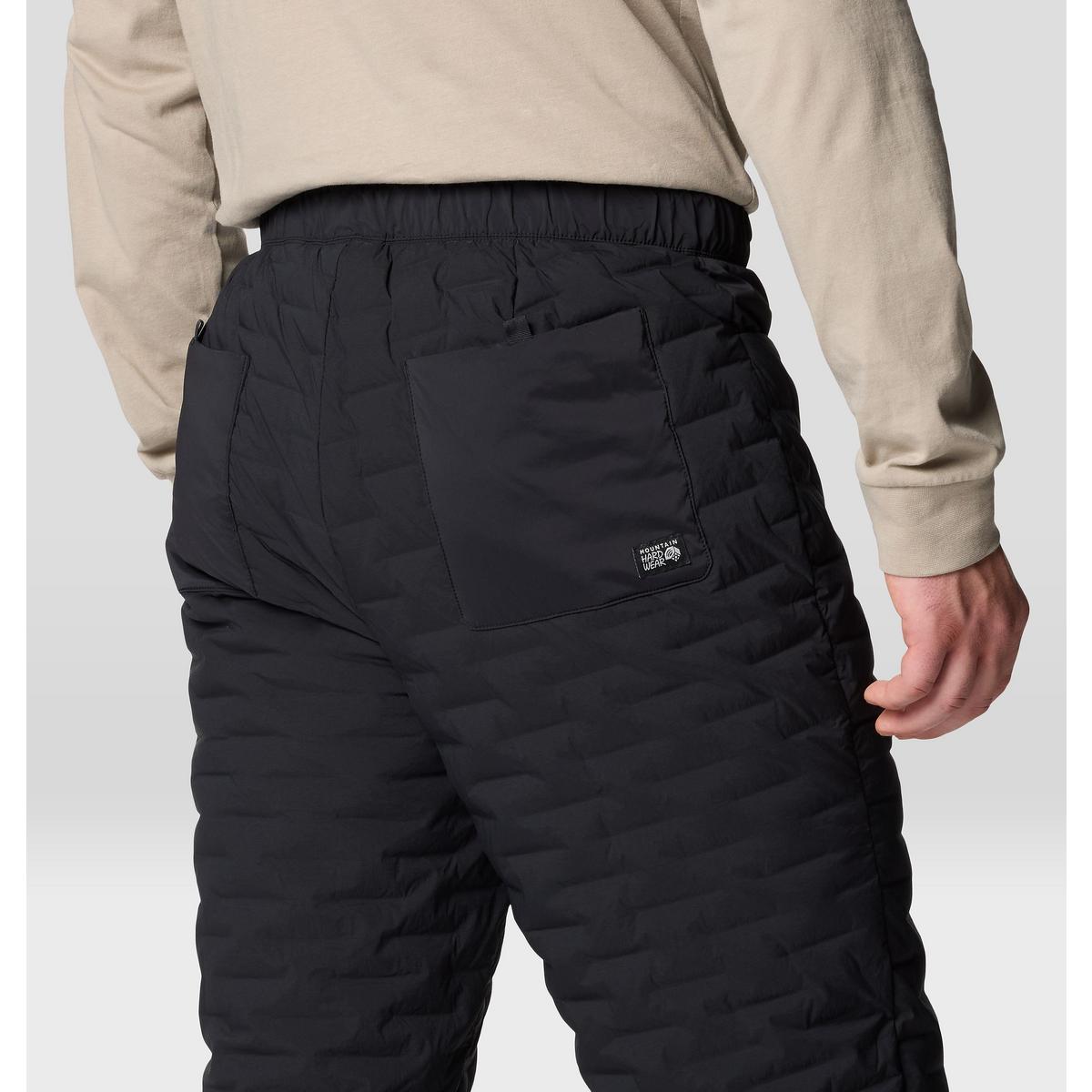 Black quilted insulated pants back view showing elastic waistband and rear pocket