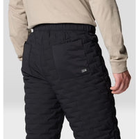Black quilted insulated pants back view showing elastic waistband and rear pocket