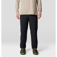 Black quilted insulated pants with textured baffling, front view on male model