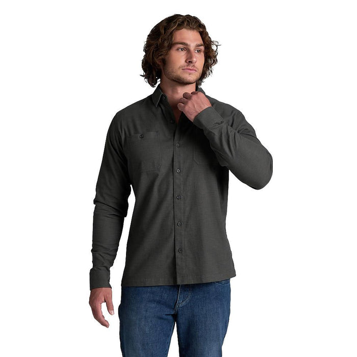 Men's long-sleeve button-up flannel shirt in dark charcoal, front view on model