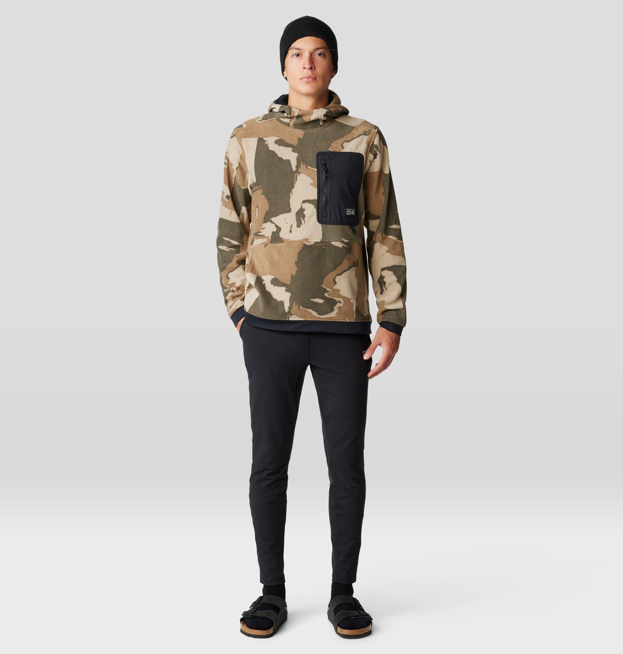 Men's slim-fit black jogger pants shown on model, front view, full length