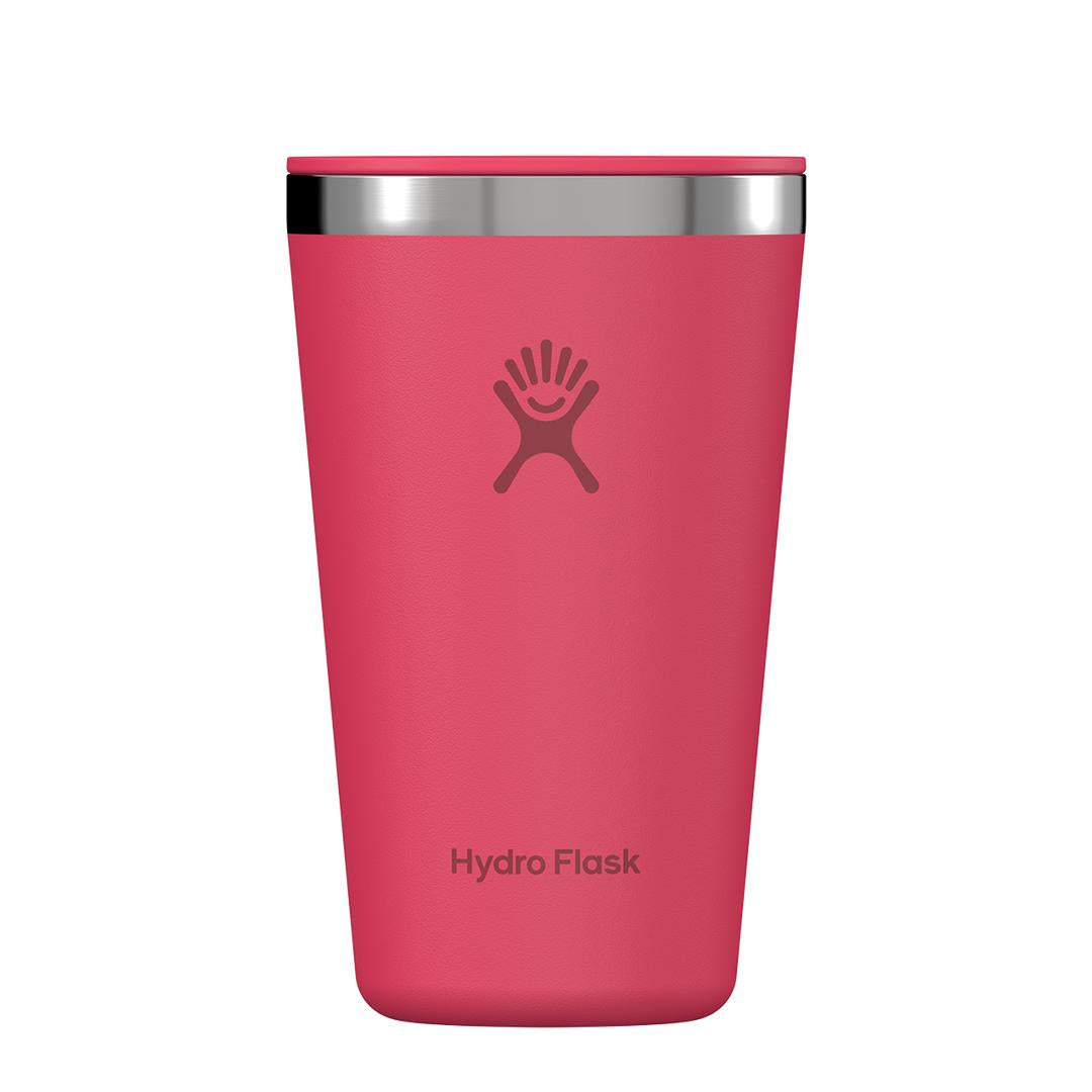 Pink insulated tumbler with stainless steel rim, hand logo, and tumbler lid, front view