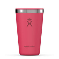 Coral pink insulated stainless steel tumbler with silver rim, front view