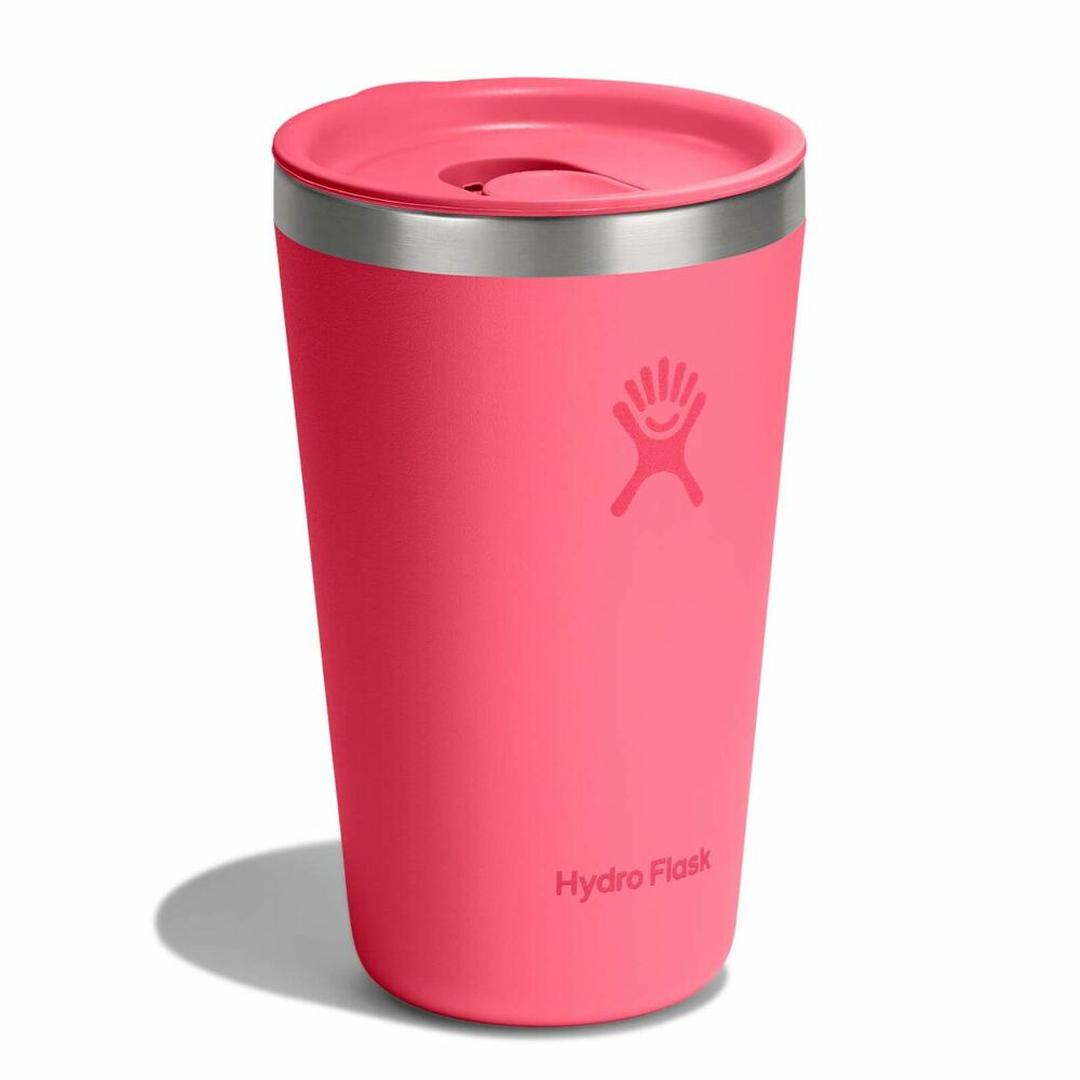 Hot pink insulated tumbler with matching lid and stainless steel rim, front view