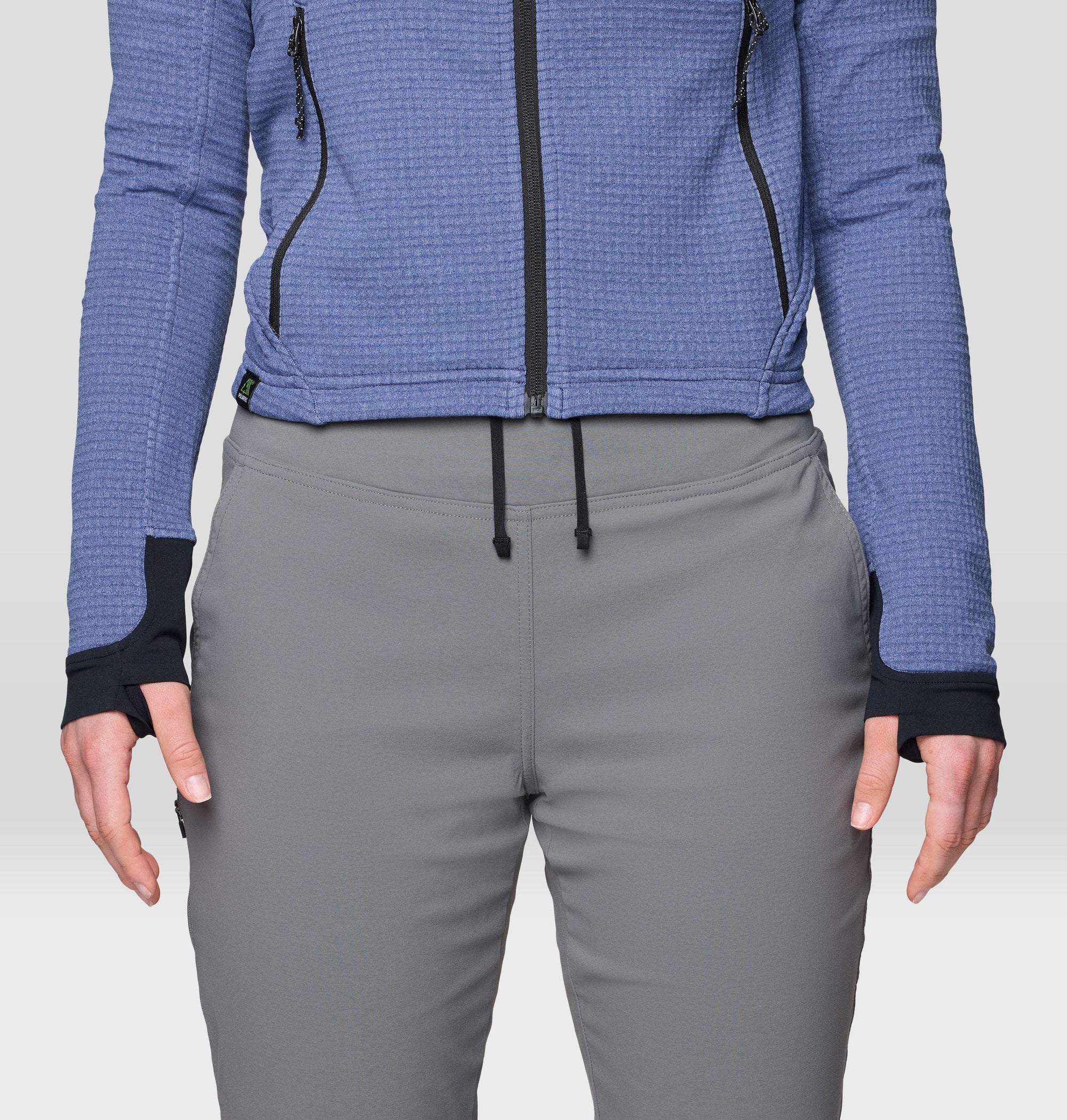 Women's gray jogger pants with elastic drawstring waistband, close-up front view