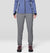 Women's slim-fit lined pants in gray, front view, paired with hiking boots