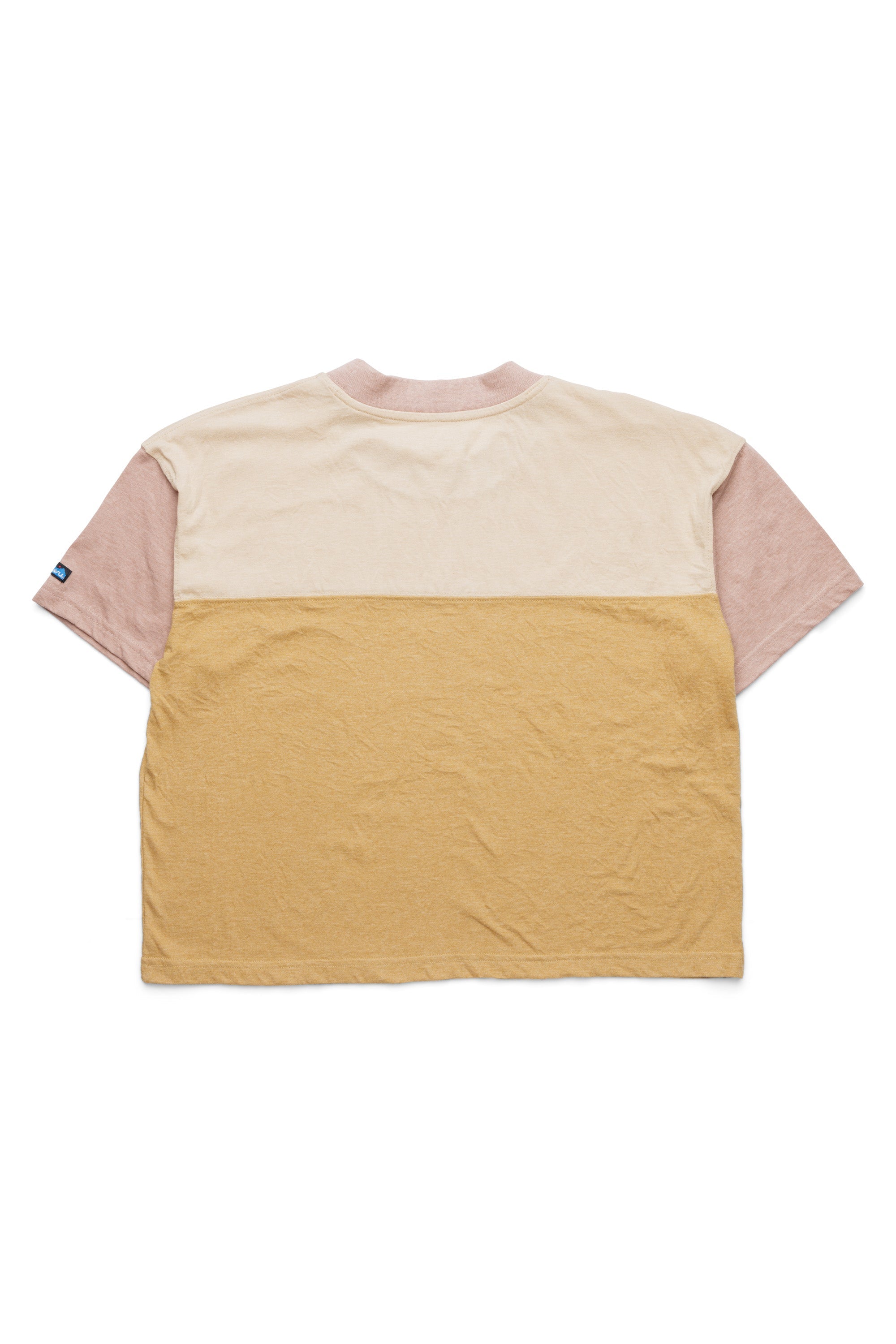 Color-blocked short sleeve t-shirt with pink sleeves, cream chest, and yellow bottom section