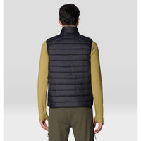 Men's quilted puffer vest in black, back view, worn over olive long-sleeve shirt