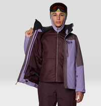 Women's 3-in-1 ski jacket shown open, revealing insulated inner layer, on model with goggles