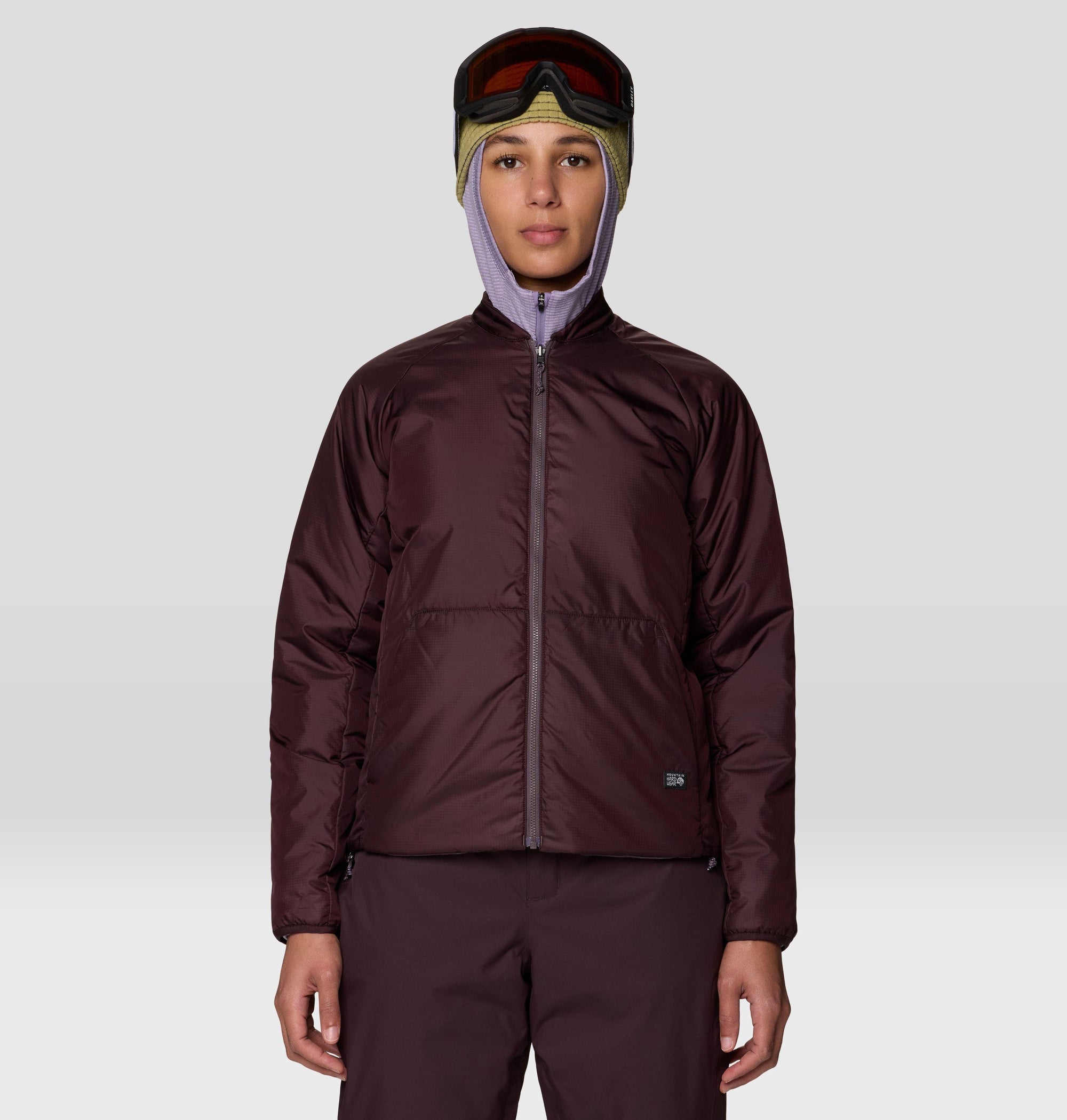 Women's insulated zip-up jacket in dark burgundy, front view, with cropped silhouette
