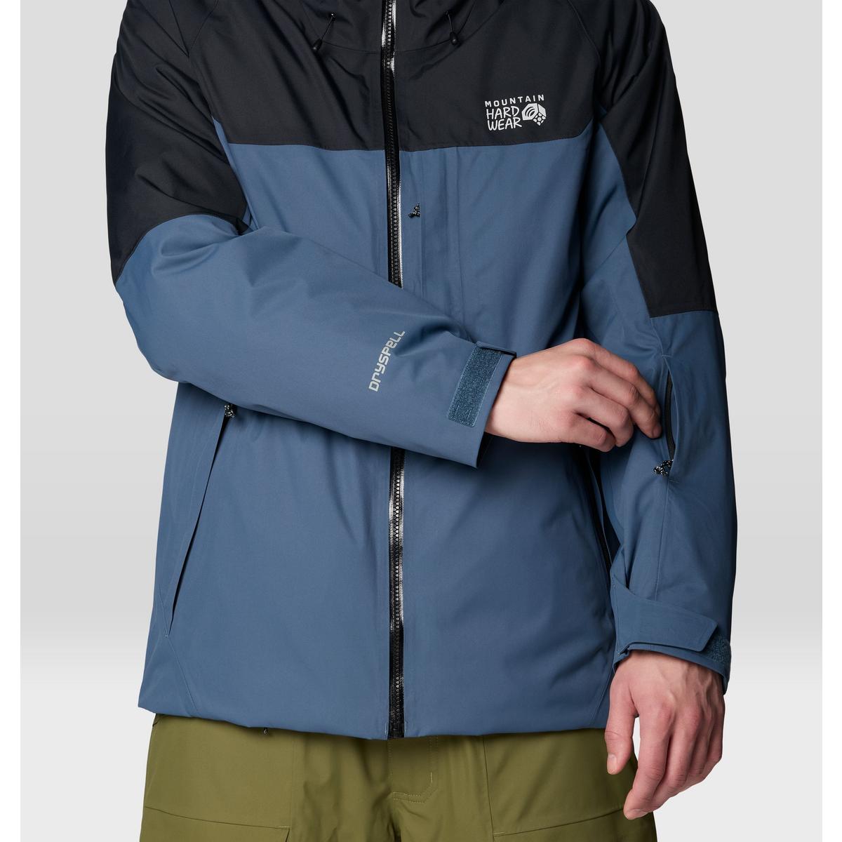 Men's waterproof ski jacket with two-tone blue and black colorblock design, Dryspell branding on sleeve