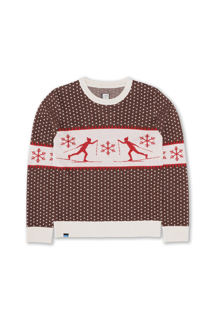 Crew neck knit sweater with brown dotted pattern and cream band featuring red skiers and snowflakes