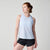 Light blue sleeveless athletic tank top with racerback design on female model