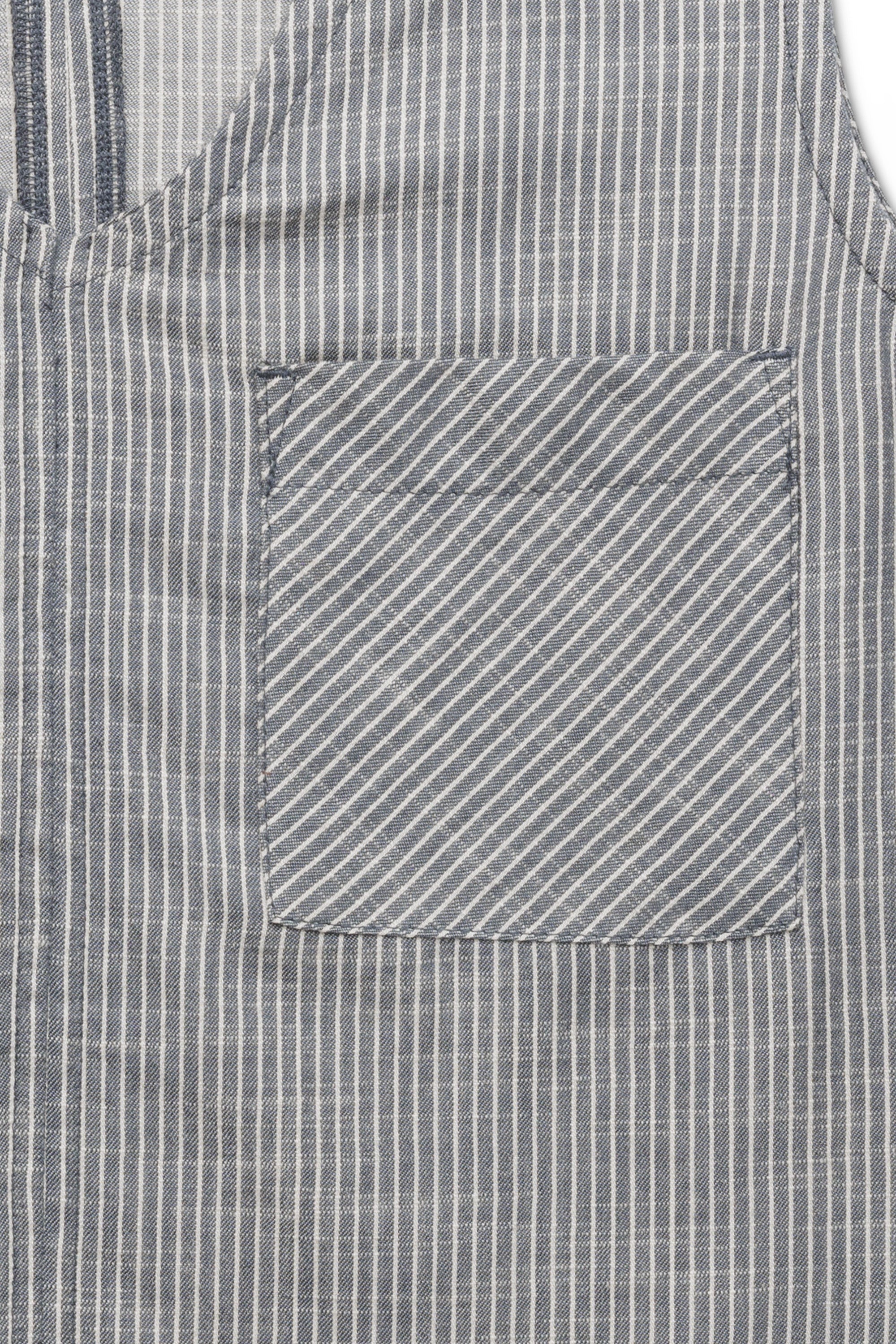 Striped button-up shirt with chest pocket in gray and white pattern