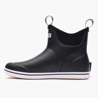 Black ankle deck boot with pull tabs, white sole, and elastic side panel, lateral view