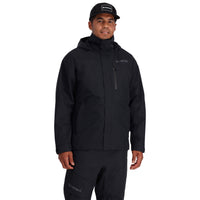 Black outdoor jacket with hood and chest pocket worn by model on white background