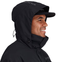 Black hooded jacket with adjustable hood and high collar, side profile view