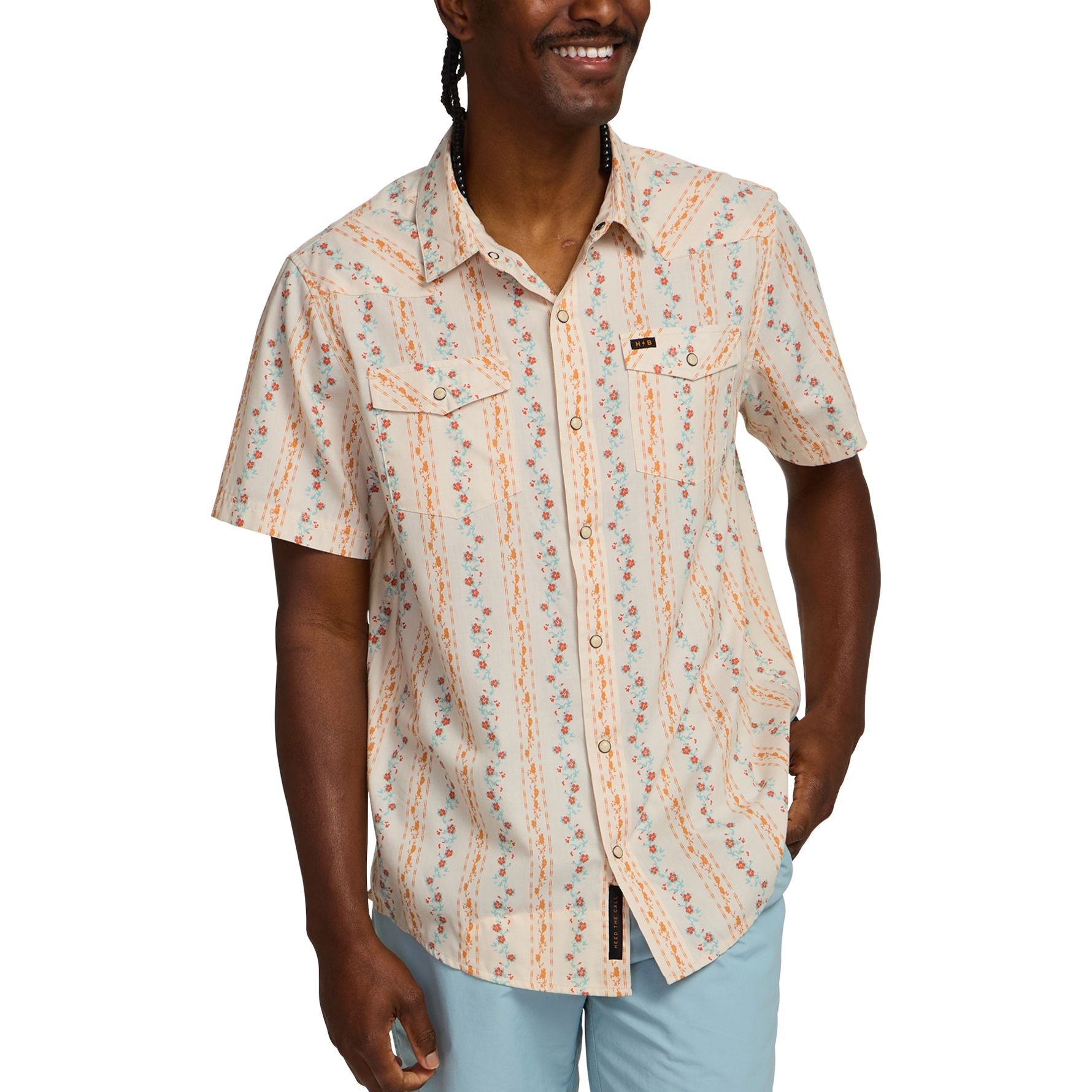 Men's short-sleeve snap-button Western shirt with floral ribbon stripe print, front on-model view