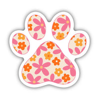 Paw print shaped sticker with pink and orange flower pattern on cream background