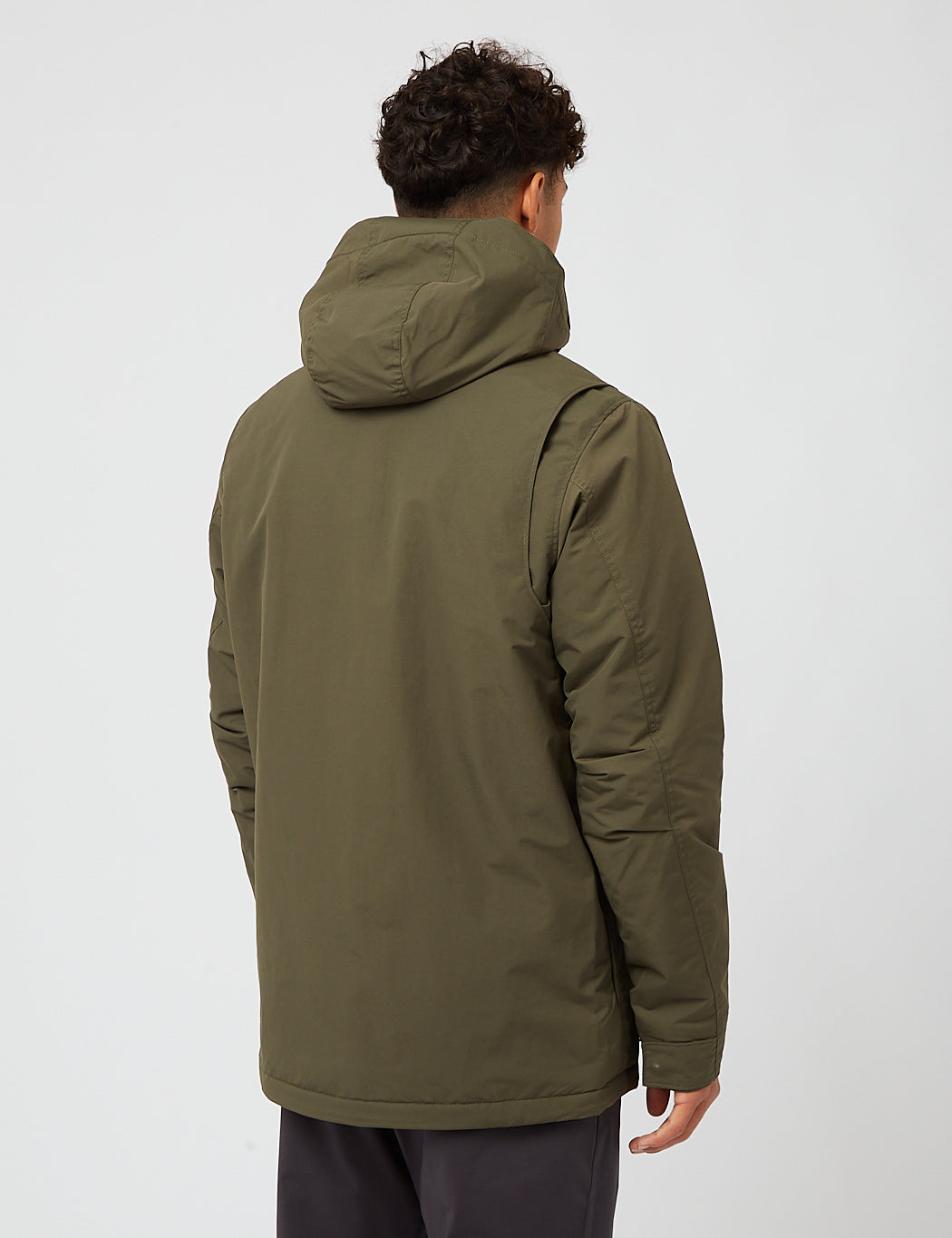 Men's hooded parka in olive green, back view showing hood and relaxed fit