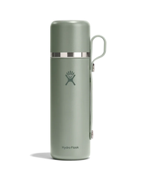 Sage green insulated thermos with cup lid and handle attachment, studio shot on white background