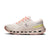 Women's running shoe in off-white with coral laces, yellow heel accent, and chunky cushioned sole, lateral view