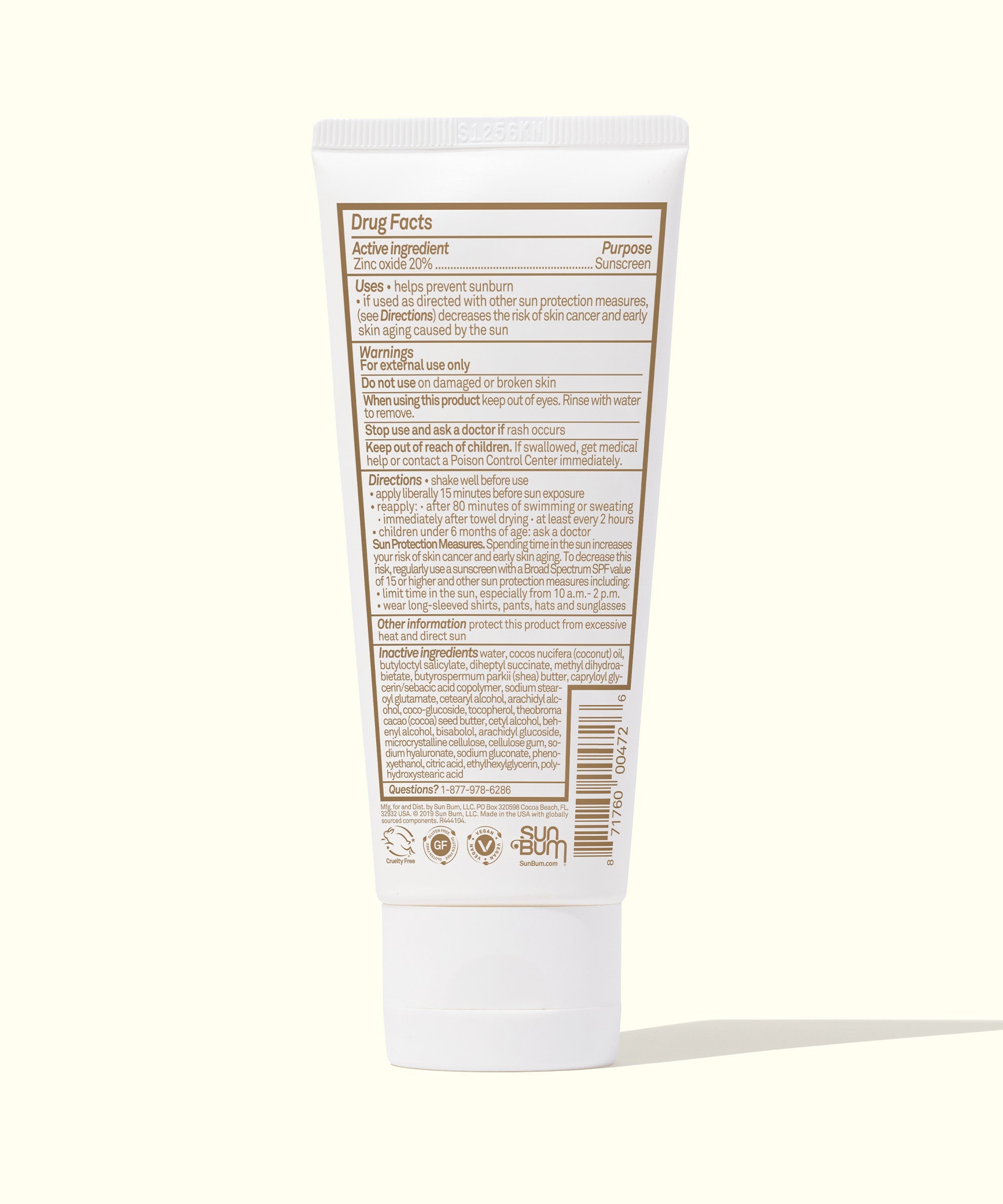 White sunscreen tube showing back panel with drug facts and ingredient information