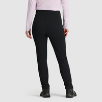 Women's slim-fit fleece-lined pants in black, back view, shown with hiking shoes