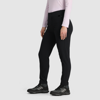 Black slim-fit fleece-lined pants on model, side view, with trail running shoes