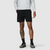 Black athletic shorts with drawstring waist worn by model with tattooed leg