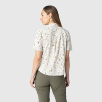 Women's short sleeve button-up shirt with speckled print pattern, shown from back view