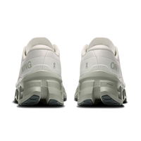 Rear view of a pair of chunky running shoes with segmented midsole pods and heel logo
