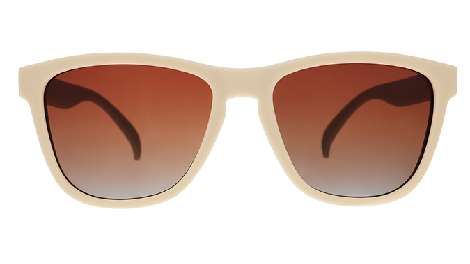 Cream colored sunglasses with brown gradient lenses shown in front view