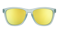Mint green framed sunglasses with gold mirrored lenses, front view on transparent background