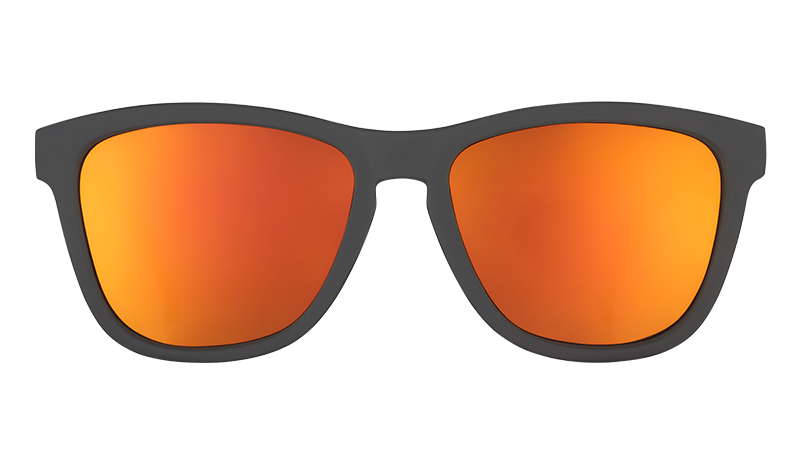 Wayfarer-style sunglasses with dark frame and orange reflective lenses, front view