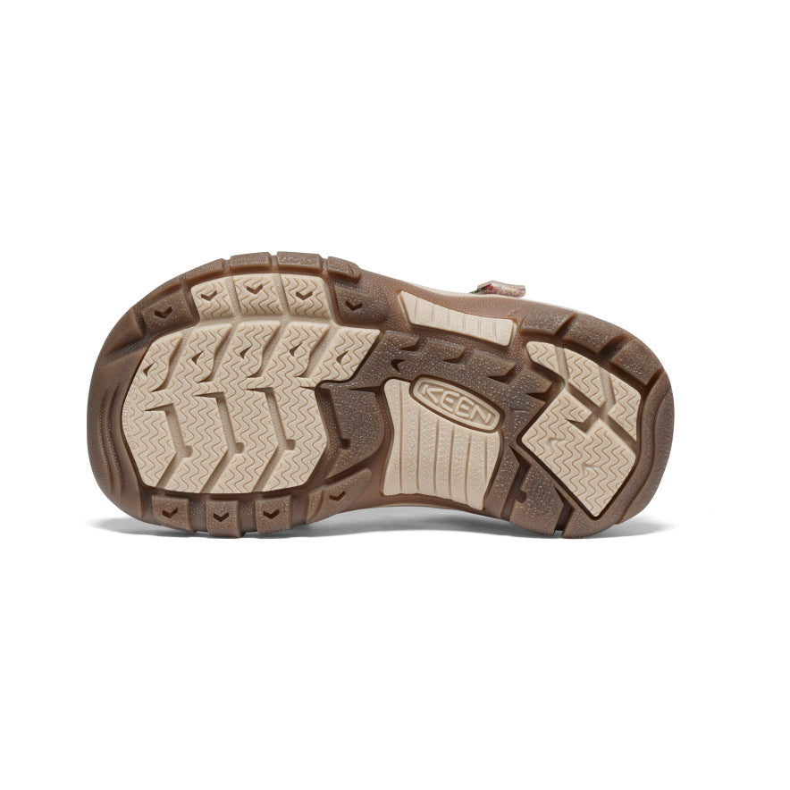 Bottom view of brown water sandal showing detailed tread pattern and textured rubber sole