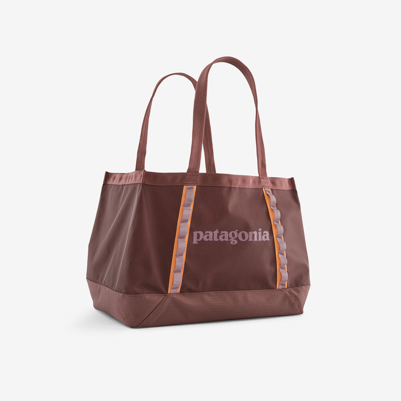 Large tote bag in dusty rose color with orange accent stripes and dual handles