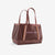 Large tote bag in dusty rose color with orange accent stripes and dual handles