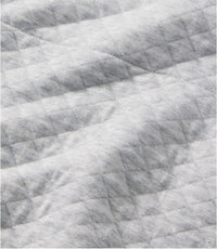 Light gray quilted sweatshirt fabric showing diamond pattern stitching detail