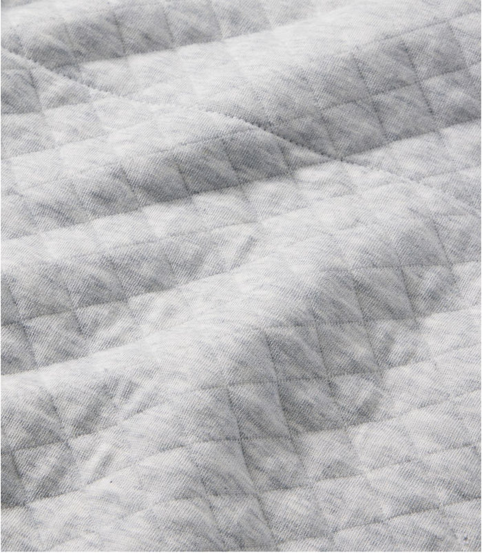 Light gray quilted sweatshirt fabric showing diamond pattern stitching detail