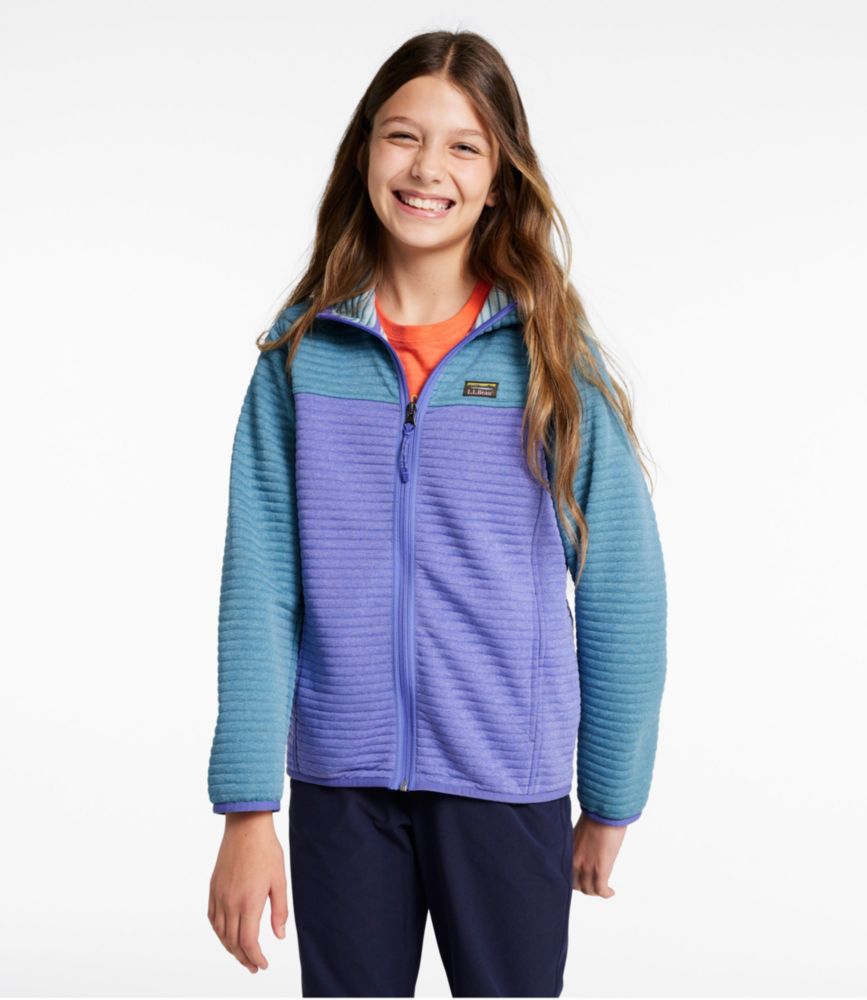 Colorblock quilted jacket with purple body and blue sleeves on young person