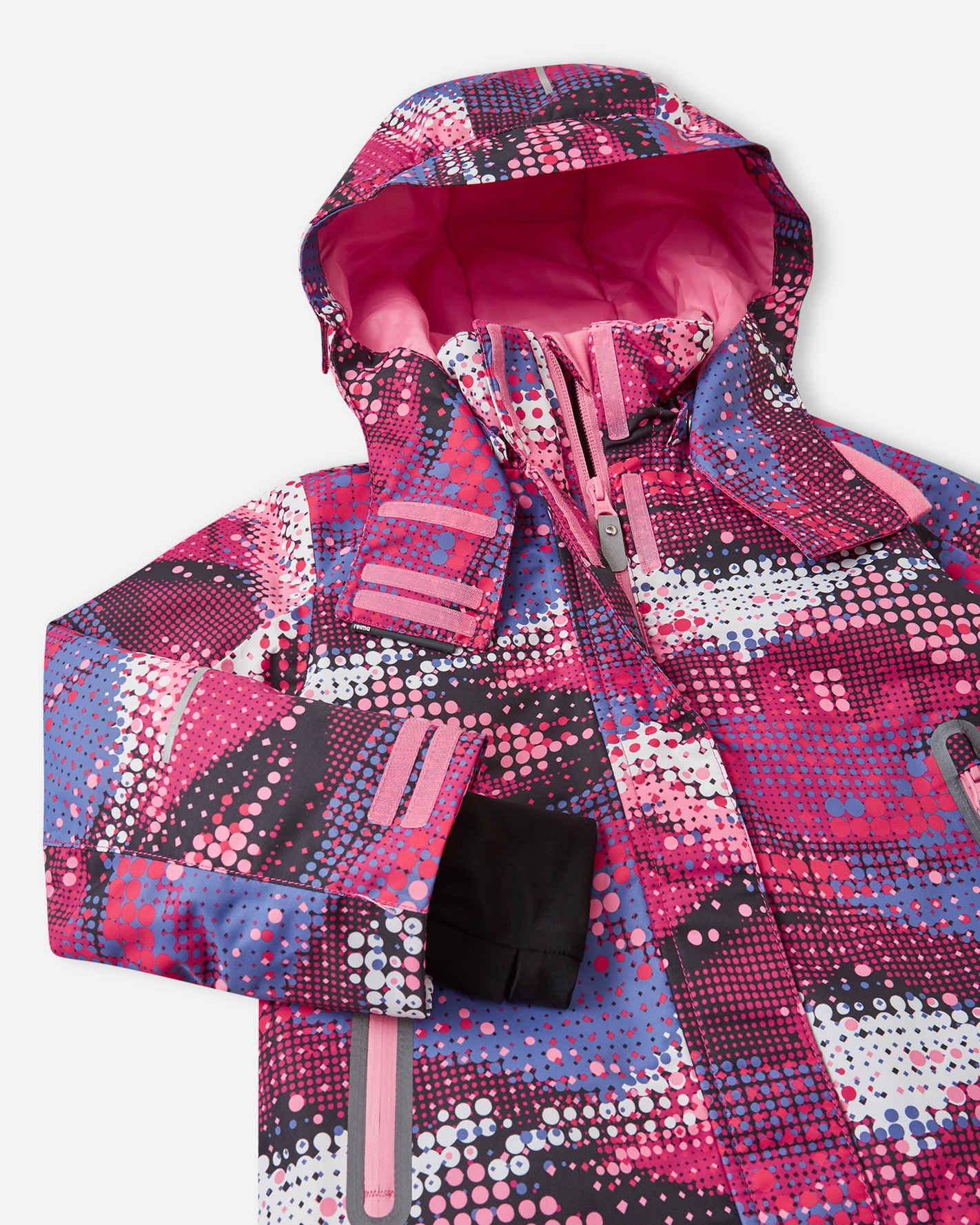 Children's winter jacket close-up showing hooded detail, zipper, and pink grey dotted plaid print