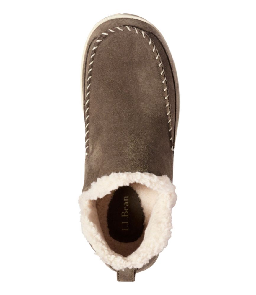 Top-down view of suede moccasin slipper boot with sherpa fleece lining and whipstitch detail