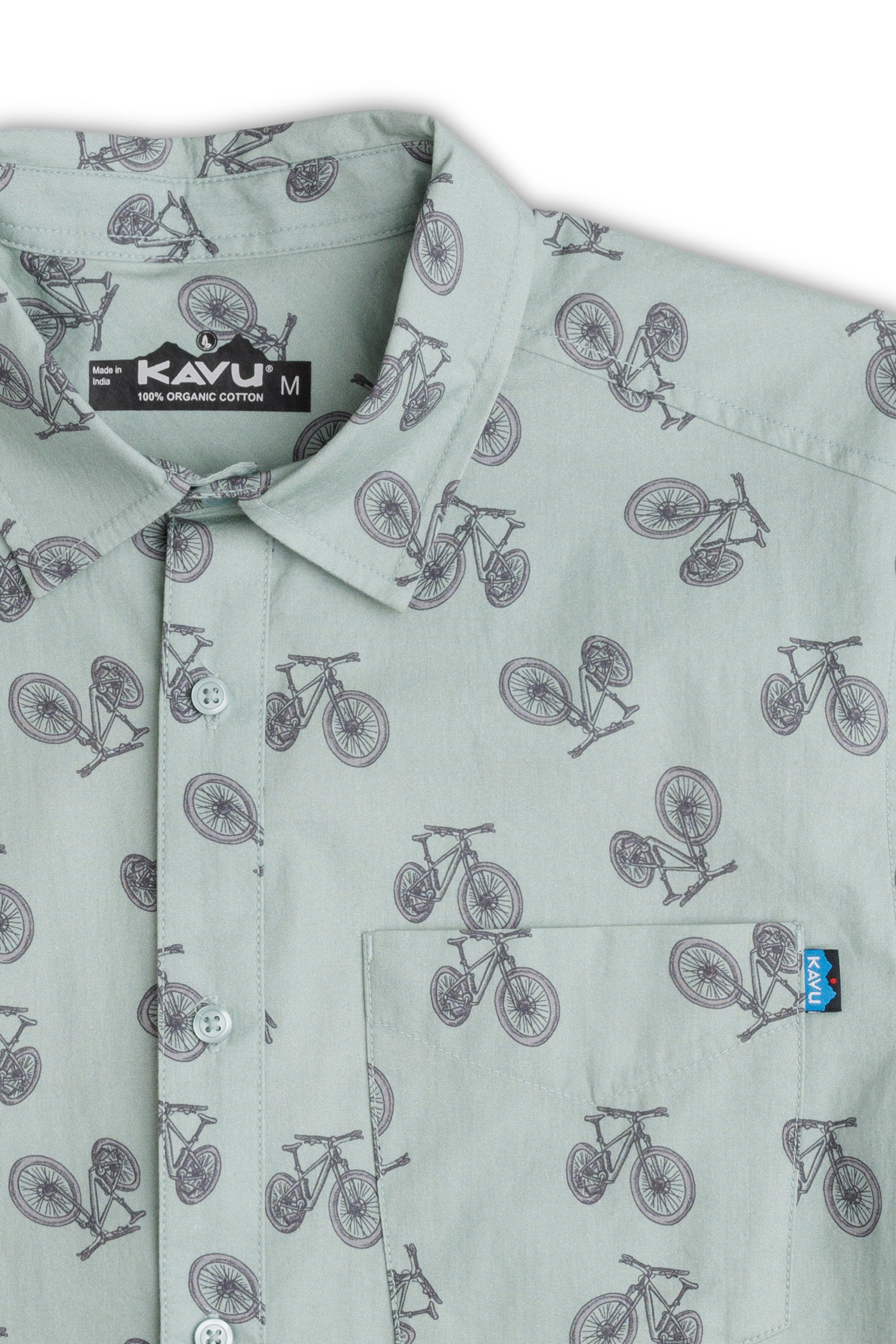 Light green button-up shirt with bicycle print pattern, collar and chest pocket detail